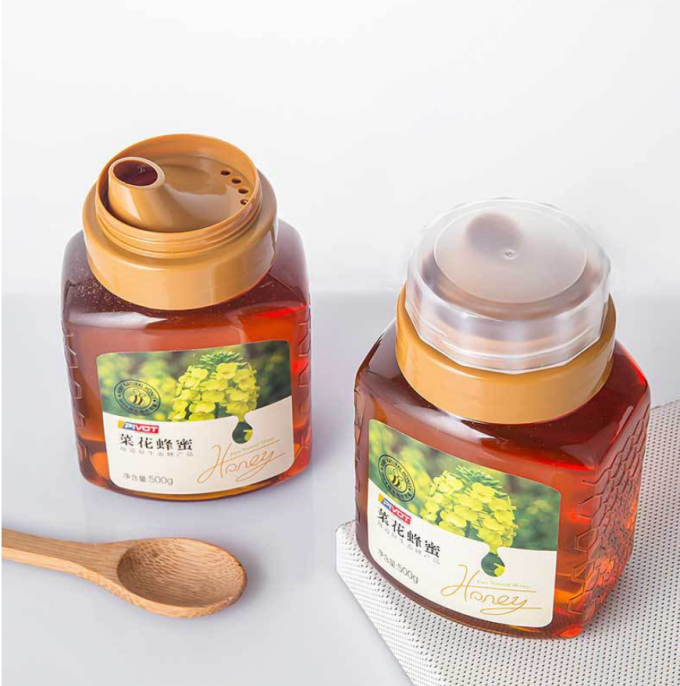 500g 700g επαναχρησιμοποιήσιμα πλαστικά βάζα μπουκαλιών ποτών μελιού πλαστικά συμπιέσιμα 0